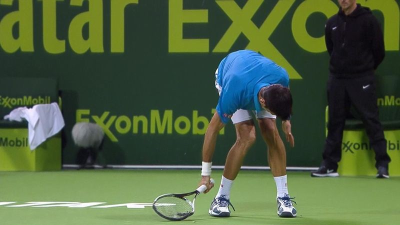 Djokovic smashes racket, takes point penalty and loses game
