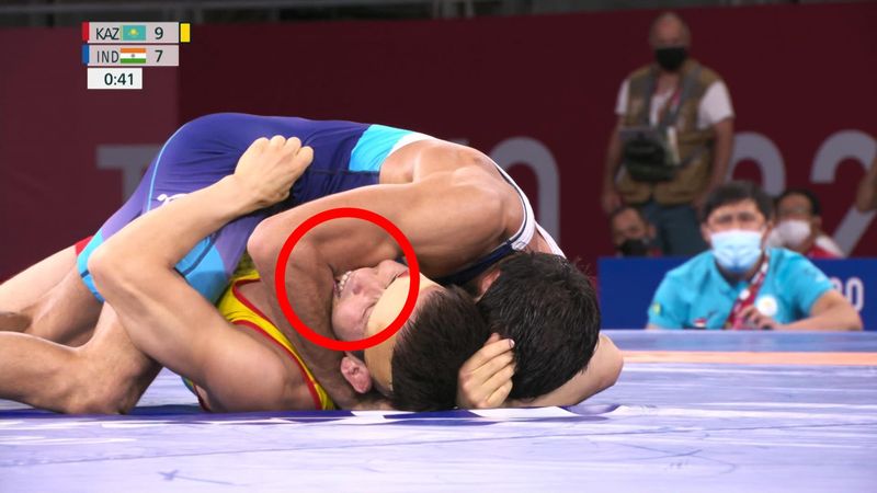 Shocking footage reveals full-jawed bite on arm in wrestling medal bout
