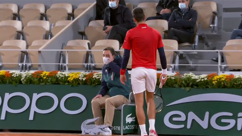 Watch Djokovic hit line judge on the head by accident